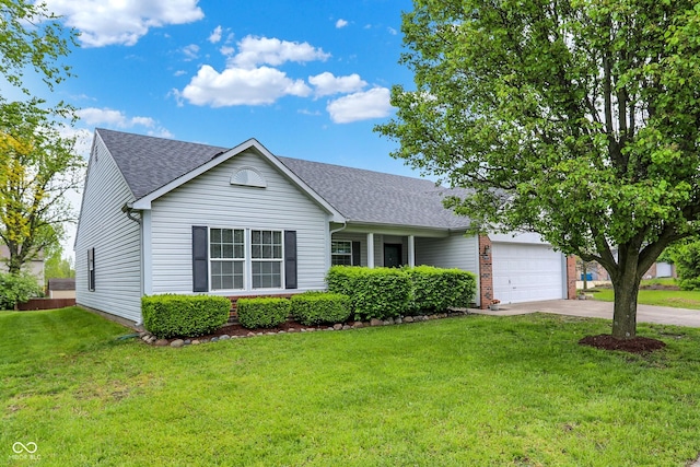 7156 Chemistry Ct, Indianapolis, IN 46239 - view of front of house with concrete driveway, an attached garage, a shingled roof, and a front yard