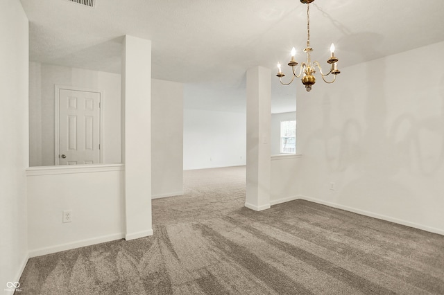 7156 Chemistry Ct, Indianapolis, IN 46239 - spare room with carpet flooring, a chandelier, and baseboards