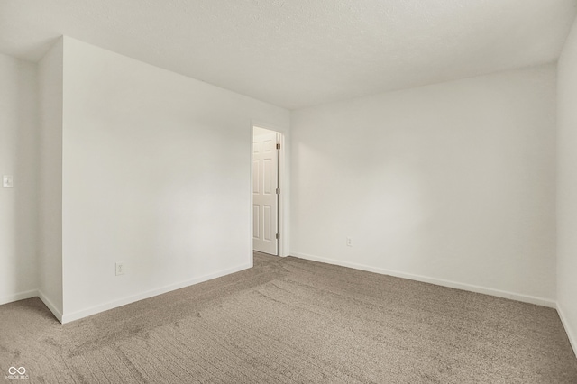 7156 Chemistry Ct, Indianapolis, IN 46239 - unfurnished room featuring carpet flooring and baseboards