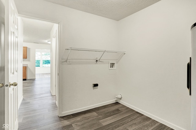 7156 Chemistry Ct, Indianapolis, IN 46239 - washroom with wood finished floors, hookup for a washing machine, baseboards, electric dryer hookup, and a textured ceiling