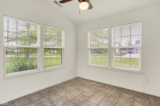 7156 Chemistry Ct, Indianapolis, IN 46239 - spare room with ceiling fan, vaulted ceiling, baseboards, and light tile patterned floors