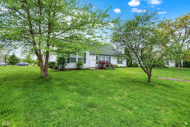 7156 Chemistry Ct, Indianapolis, IN 46239 - ranch-style house featuring a front yard