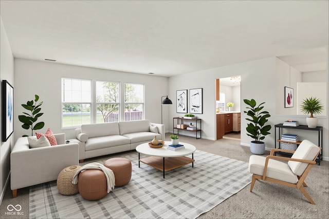 7156 Chemistry Ct, Indianapolis, IN 46239 - living area featuring baseboards and light colored carpet