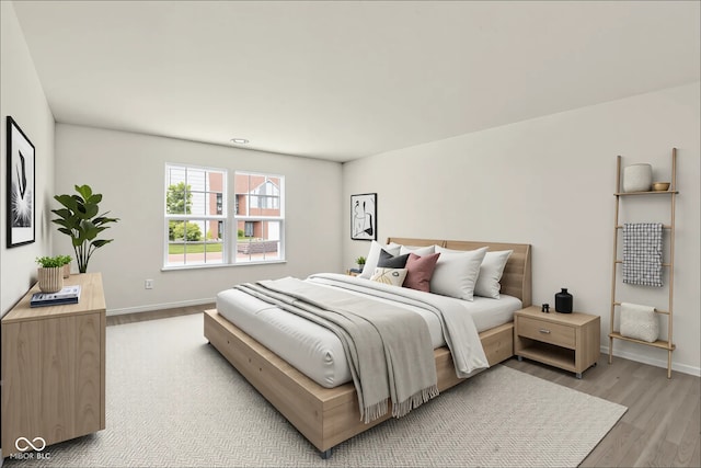 7156 Chemistry Ct, Indianapolis, IN 46239 - bedroom with light wood-style flooring and baseboards