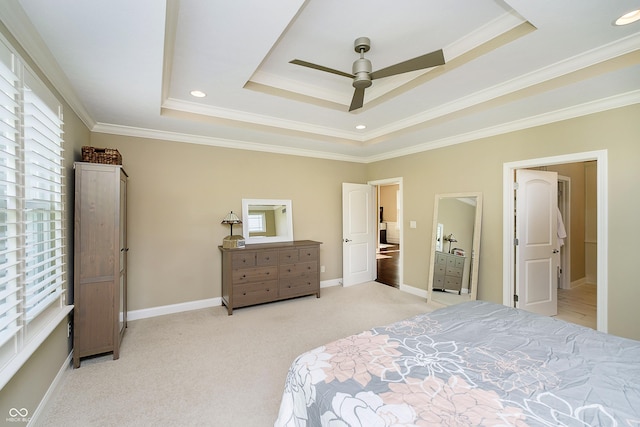 14003 Grannan Ln, Carmel, IN 46074 - bedroom with a tray ceiling, ornamental molding, light carpet, baseboards, and a ceiling fan
