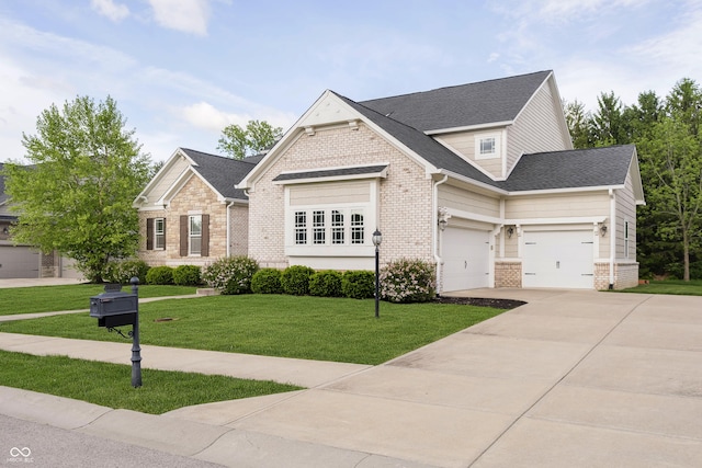 14003 Grannan Ln, Carmel, IN 46074 - craftsman inspired home with brick siding, driveway, a front lawn, an attached garage, and a shingled roof