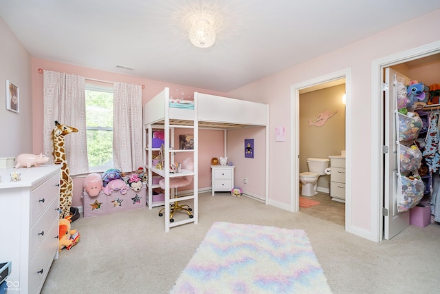 14003 Grannan Ln, Carmel, IN 46074 - carpeted bedroom featuring ensuite bath, baseboards, and a walk in closet