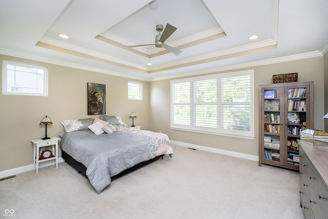 14003 Grannan Ln, Carmel, IN 46074 - bedroom featuring a tray ceiling, crown molding, light carpet, and baseboards