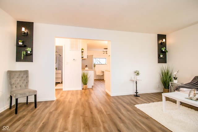 648 Market St, Hope, IN 47246 - living area featuring light wood-style flooring and baseboards
