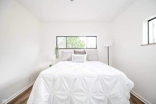 648 Market St, Hope, IN 47246 - bedroom featuring wood finished floors and baseboards