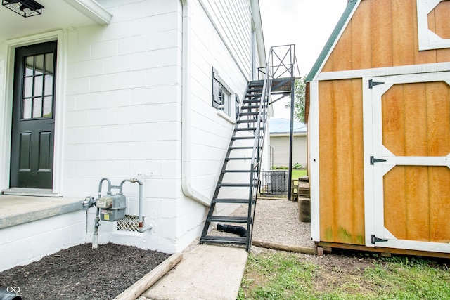 648 Market St, Hope, IN 47246 - doorway to property featuring concrete block siding