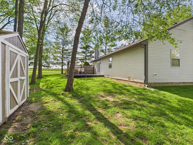 1356 S Catamaran Cir, Cicero, IN 46034 - view of green lawn featuring a shed and an outbuilding