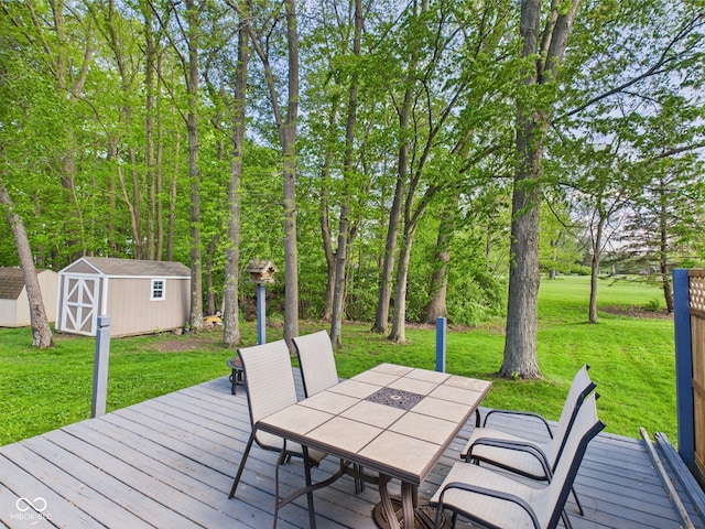 1356 S Catamaran Cir, Cicero, IN 46034 - wooden deck with a storage shed, outdoor dining space, an outdoor structure, and a yard
