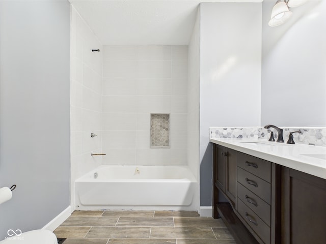1356 S Catamaran Cir, Cicero, IN 46034 - bathroom featuring wood finish floors, double vanity, toilet, shower / bathtub combination, and baseboards