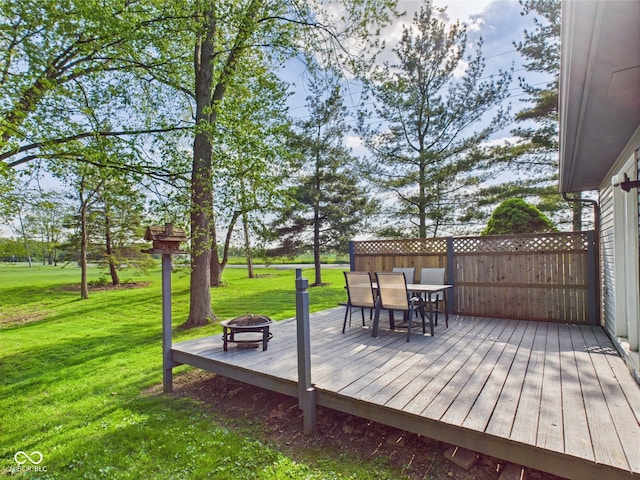 1356 S Catamaran Cir, Cicero, IN 46034 - deck with an outdoor fire pit, a yard, and outdoor dining area