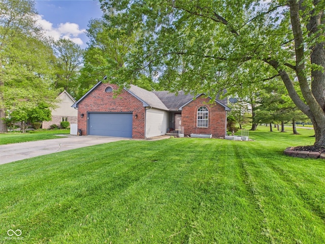 1356 S Catamaran Cir, Cicero, IN 46034 - view of front of home with brick siding, driveway, a garage, and a front lawn