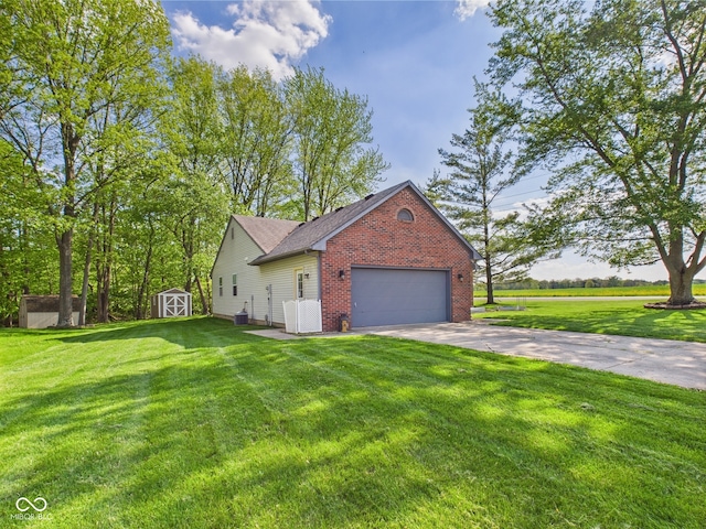 1356 S Catamaran Cir, Cicero, IN 46034 - view of side of home with brick siding, a storage unit, a garage, driveway, and a yard