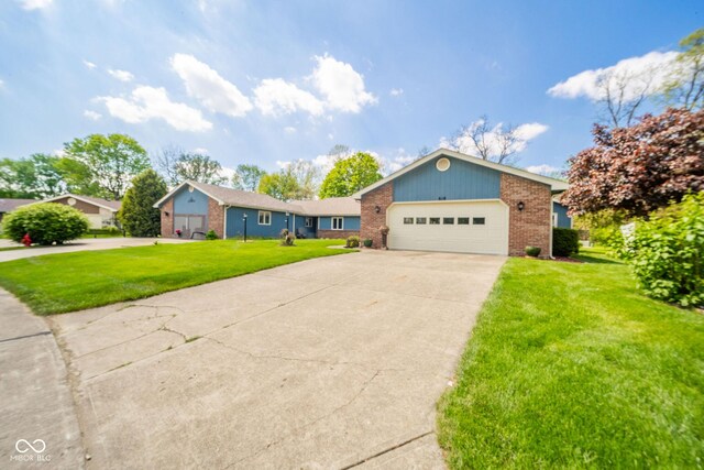 ranch-style house featuring brick siding, driveway, an attached garage, and a front lawn
