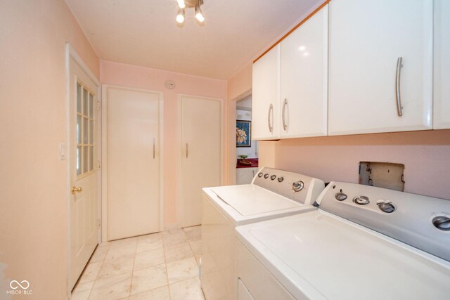 laundry area featuring cabinet space and independent washer and dryer