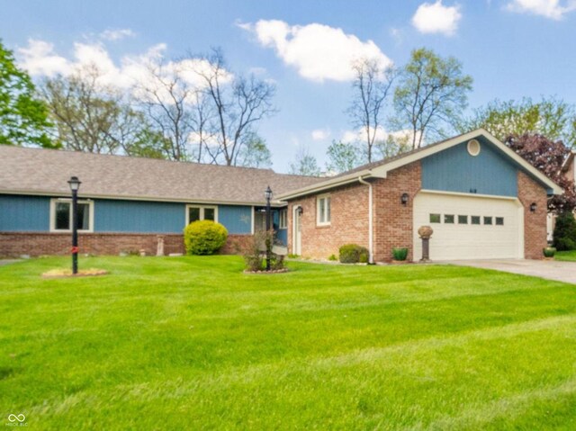 ranch-style house featuring an attached garage, brick siding, a front yard, and driveway