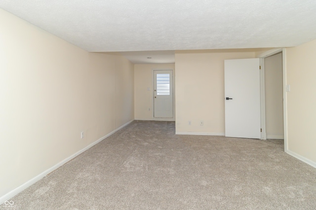 953 S 5th St, Noblesville, IN 46060 - carpeted spare room with baseboards and a textured ceiling