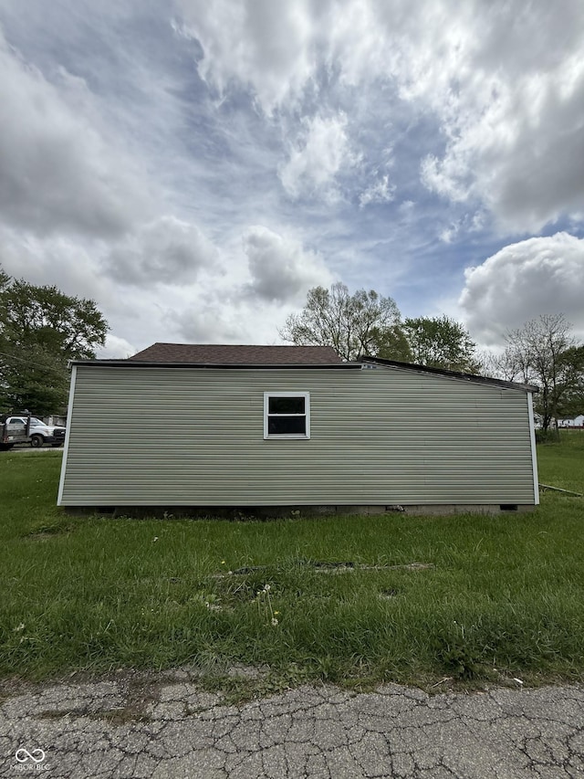 view of property exterior featuring crawl space and a yard