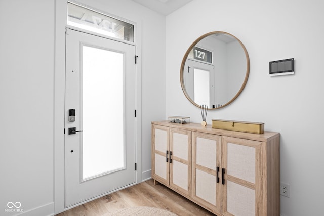 127 Monon Green Blvd, Carmel, IN 46032 - foyer with light wood-style floors