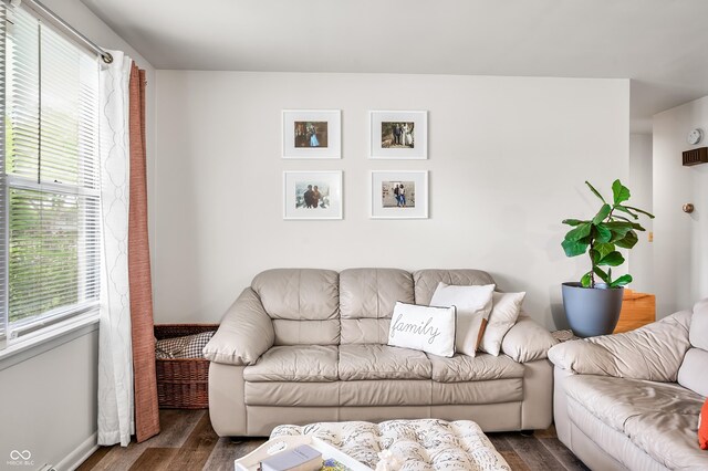 5120 Apache Ct, Columbus, IN 47203 - living room with dark wood-style floors and baseboards