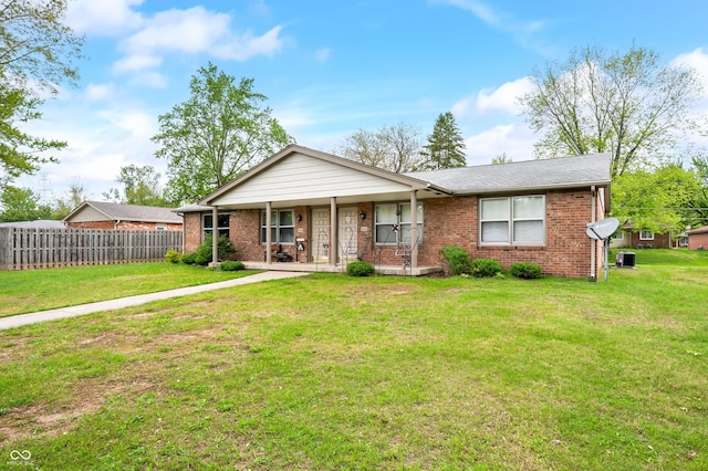 5120 Apache Ct, Columbus, IN 47203 - ranch-style home featuring brick siding and a porch