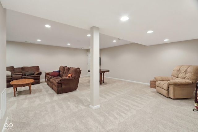 living room with light carpet, recessed lighting, and baseboards