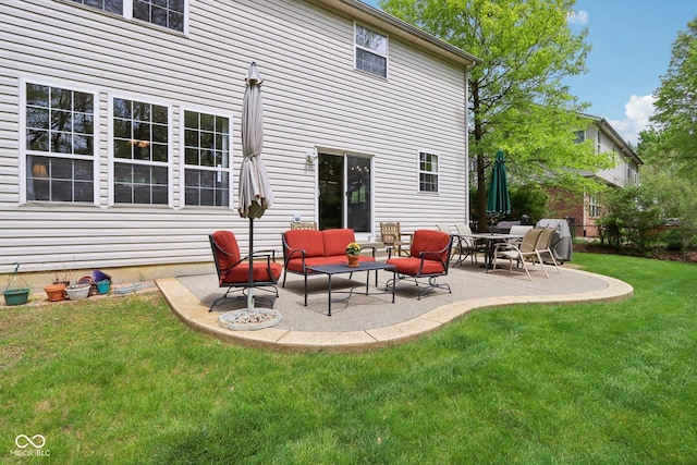 back of property featuring an outdoor living space, a lawn, and a patio area