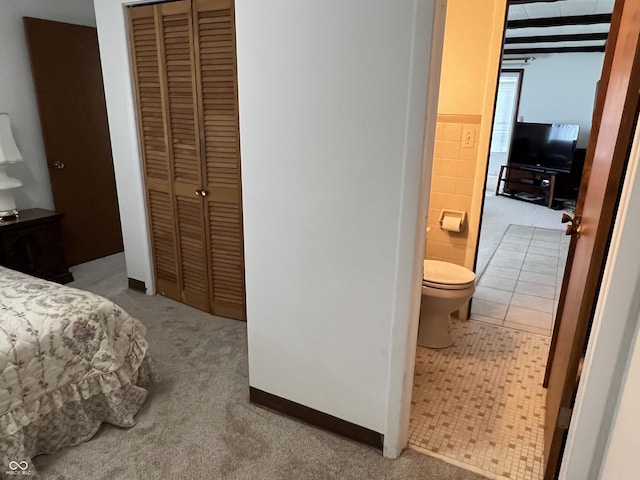 2927 E 8th St, Anderson, IN 46012 - bedroom with a closet and carpet floors