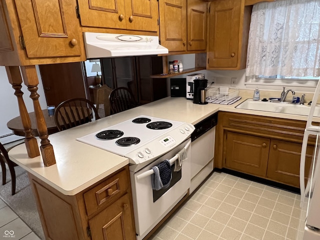2927 E 8th St, Anderson, IN 46012 - kitchen with white appliances, extractor fan, a peninsula, light countertops, and brown cabinetry