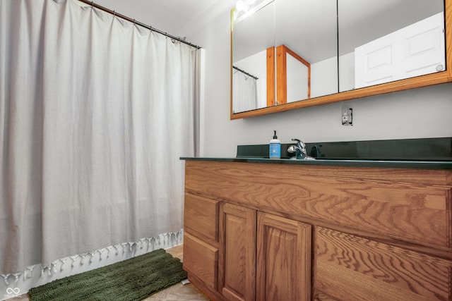 full bath featuring vanity and a shower with curtain