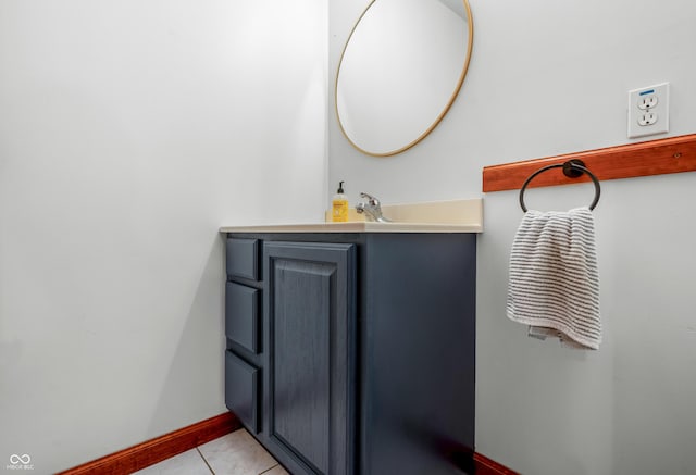 bathroom featuring vanity and baseboards