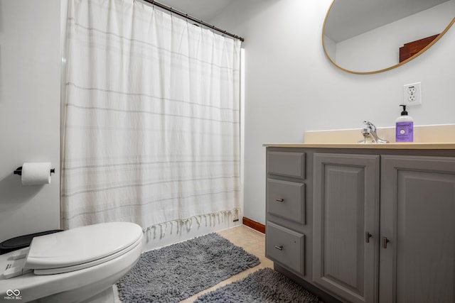 full bathroom with toilet, vanity, and a shower with shower curtain