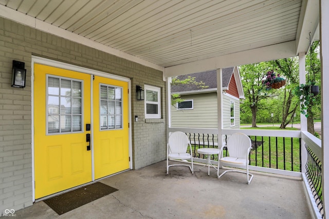 view of patio featuring a porch