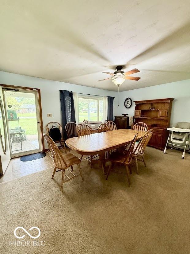 dining area with a ceiling fan