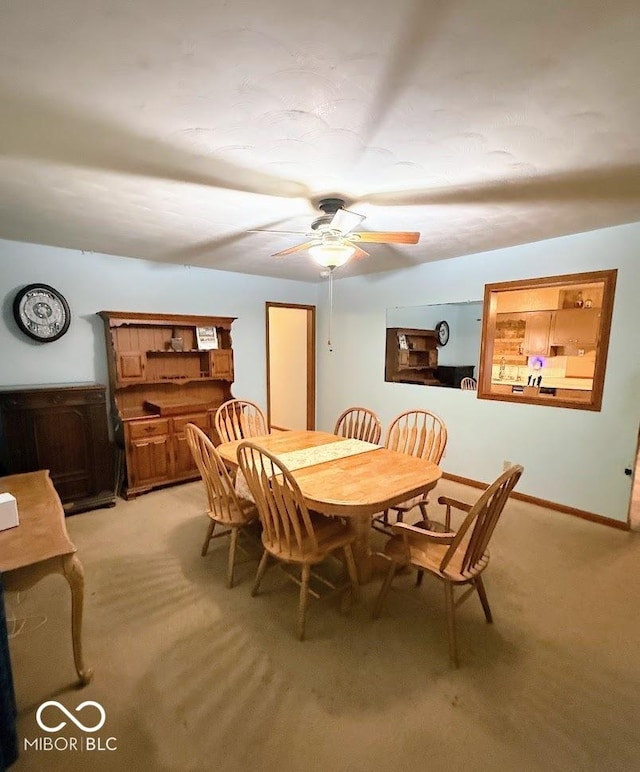 10946 Maze Rd, Indianapolis, IN 46259 - dining space with light carpet and a ceiling fan