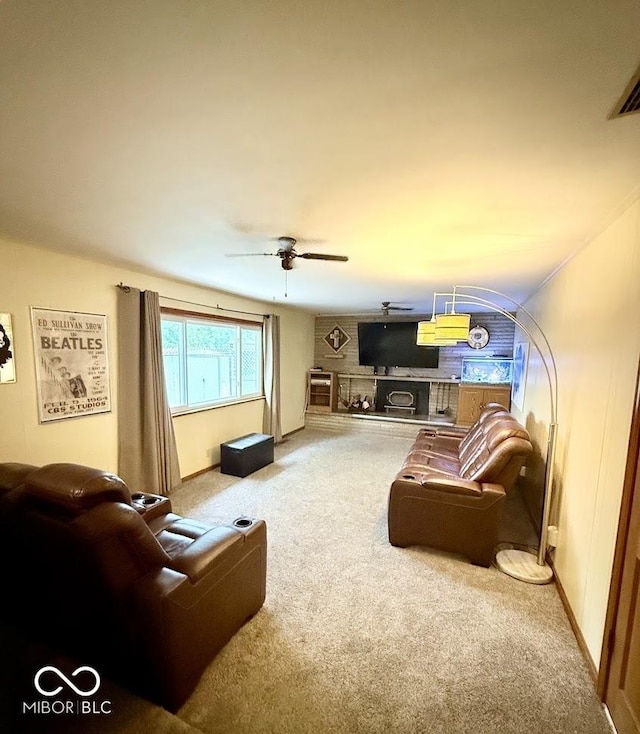 10946 Maze Rd, Indianapolis, IN 46259 - carpeted living area with a ceiling fan and baseboards