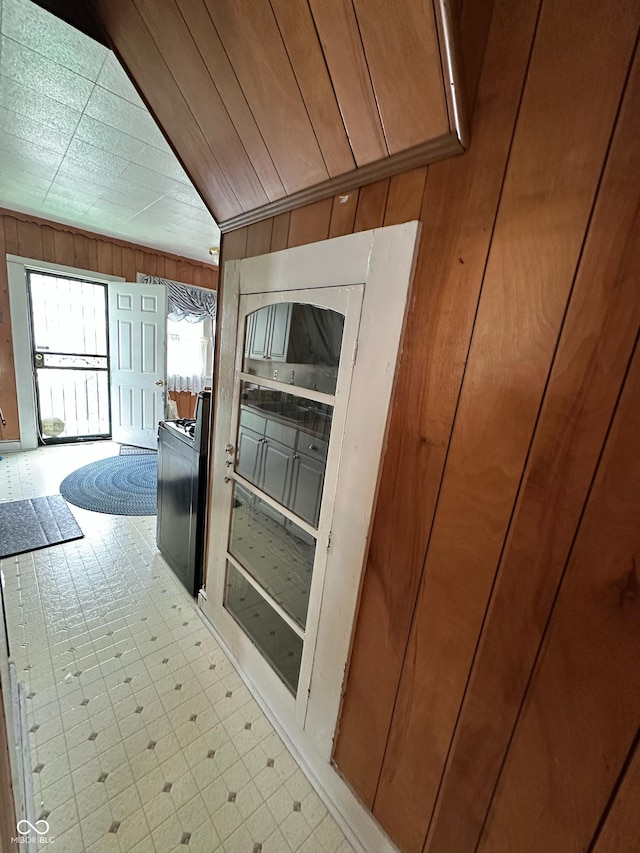 803 W 12th St, Anderson, IN 46016 - hall with wood walls and light floors