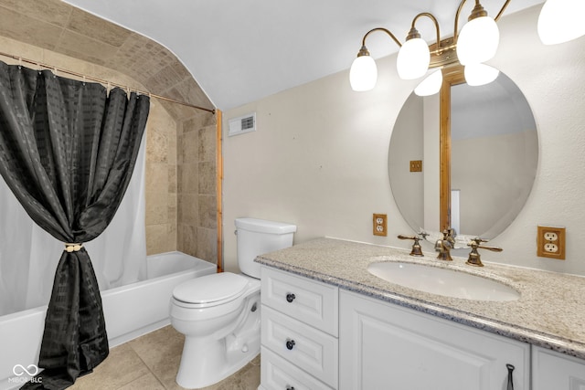 bathroom featuring vanity, toilet, tile patterned flooring, shower / tub combo with curtain, and lofted ceiling