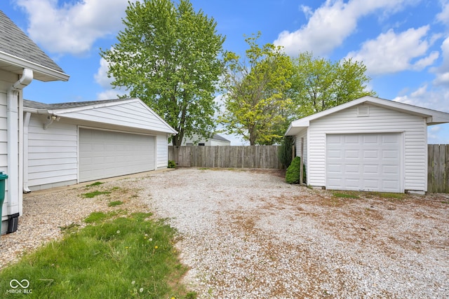 detached garage with fence