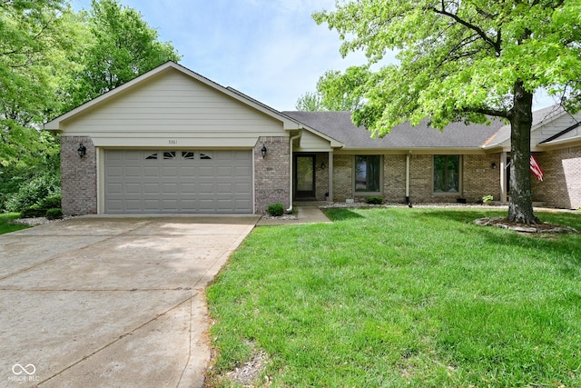 5361 Carnoustie Cir, Avon, IN 46123 - single story home with an attached garage, concrete driveway, brick siding, and a front lawn