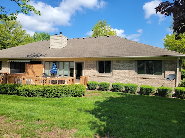 5361 Carnoustie Cir, Avon, IN 46123 - rear view of property featuring brick siding, a chimney, a lawn, and roof with shingles