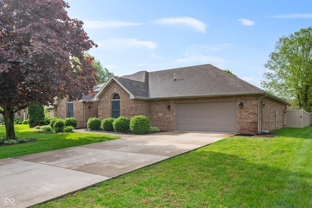 view of front facade featuring a garage, driveway, brick siding, roof with shingles, and a gate