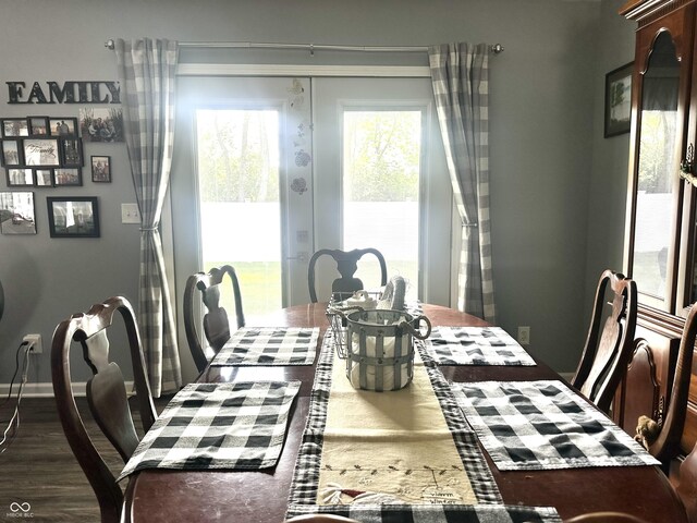dining room with dark wood finished floors
