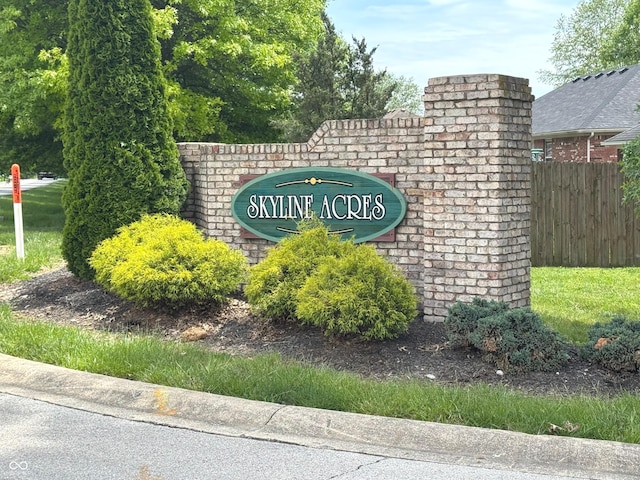 community sign with fence