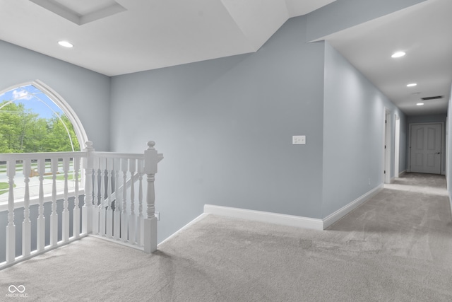 hall featuring an upstairs landing, carpet floors, recessed lighting, and baseboards