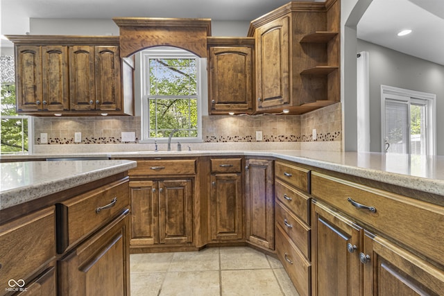 kitchen featuring open shelves, backsplash, plenty of natural light, and recessed lighting
